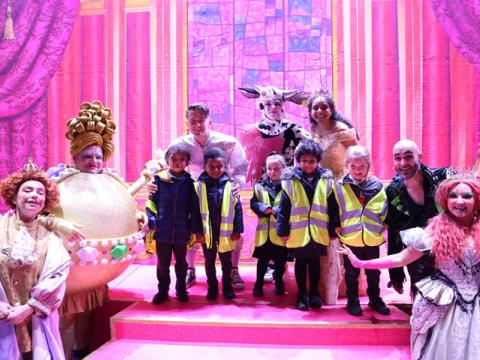 Children from Moldgreen Community Primary School with the cast of Jack and the Beanstalk at Lawrence Batley Theatre