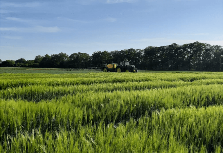 Agricultural sprayer, low drift nozzles. Syngenta barley field trials innovation centre. Herbicide treatment.
